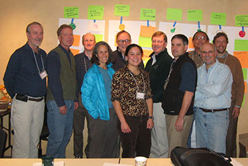 A photo of Guild Board Members at a meeting in 2011