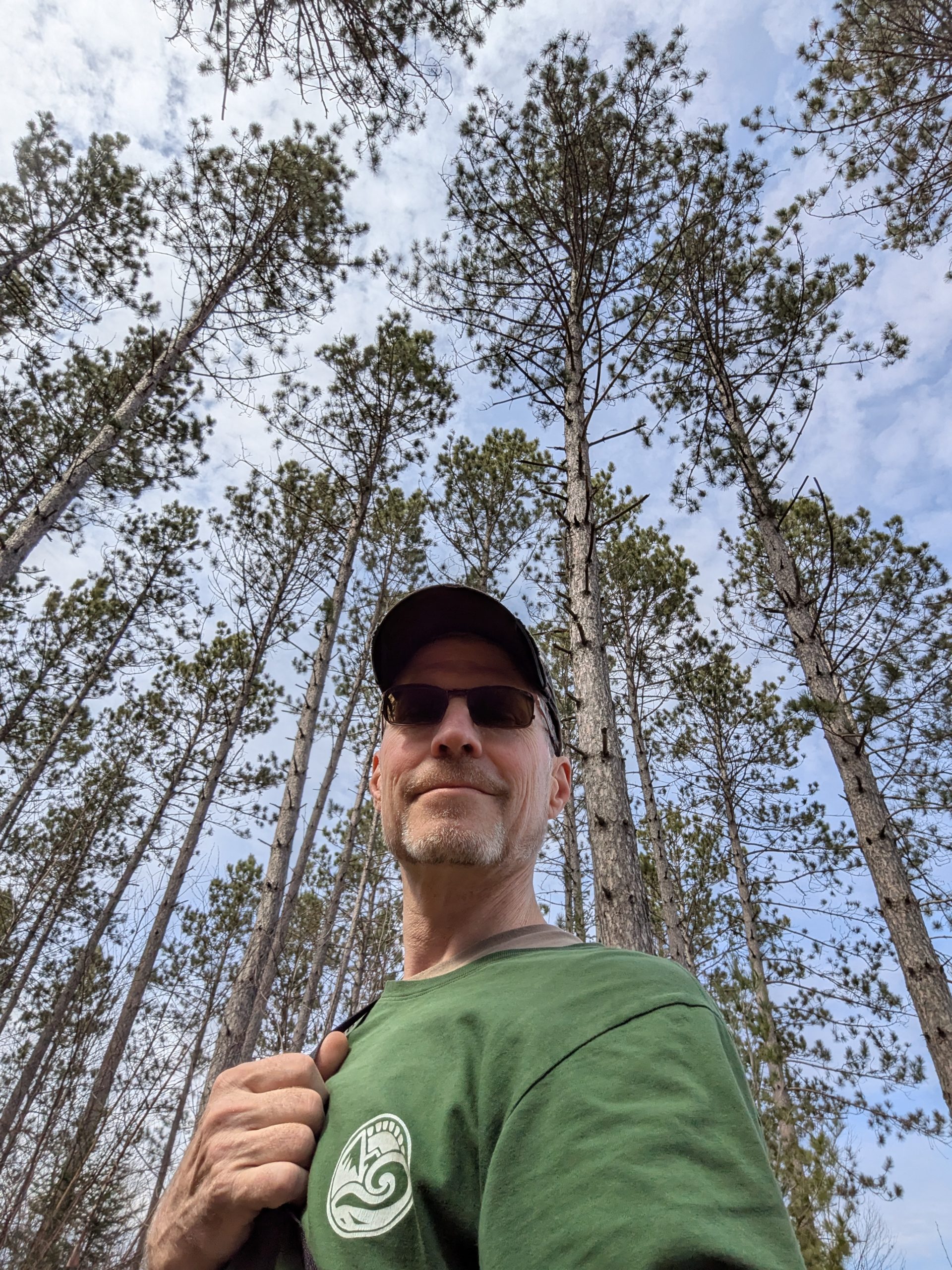 University of Alabama group in front of Caring Days sign