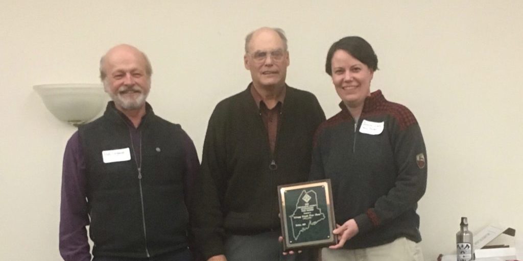 Bob and Jessica receiving the 2018 Piscataquis County Tree Farm of the Year Award from Doug Denico, the State Forester for the State of Maine. 
Source: Jessica E. Leahy, Ph.D.